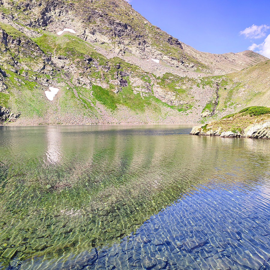 Clear water of a mountain lake at the Seven Rila Lakes, Bulgaria.