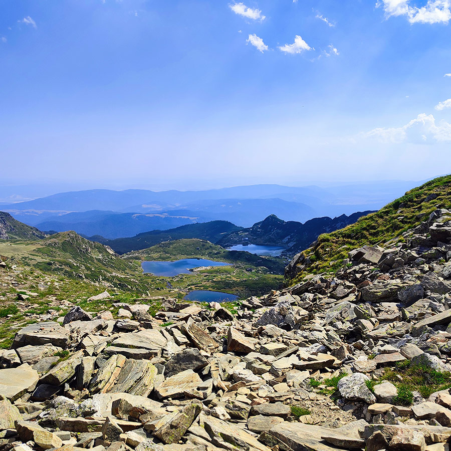 Overlooking multiple lakes from a rocky mountain trail, Seven Rila Lakes, Bulgaria.