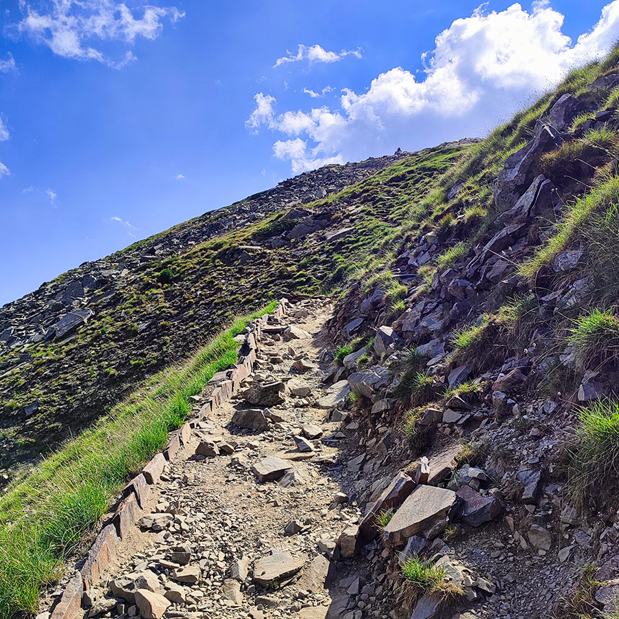 Steep mountain trail with stone steps in the Seven Rila Lakes, Bulgaria.