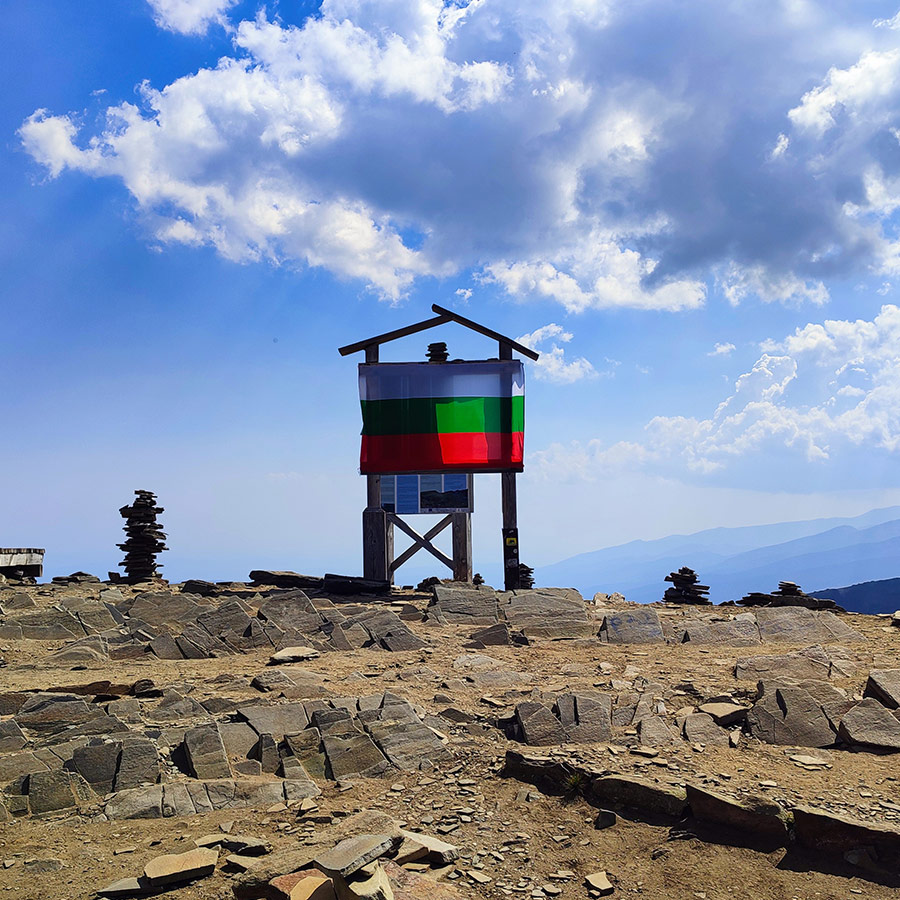 Bulgarian flag at a mountain viewpoint in the Seven Rila Lakes, Bulgaria.