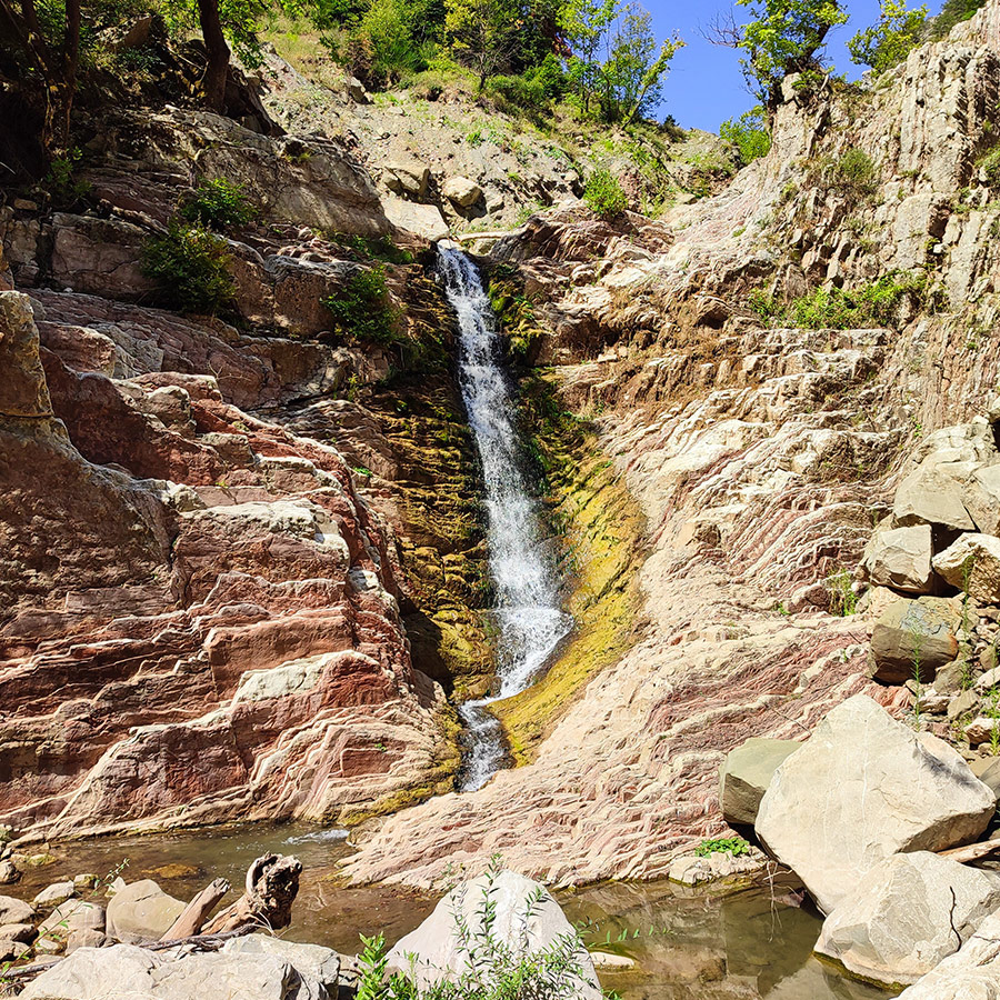 Anthochori Waterfall falling into a small pool in Agrafa, Karditsa, Greece