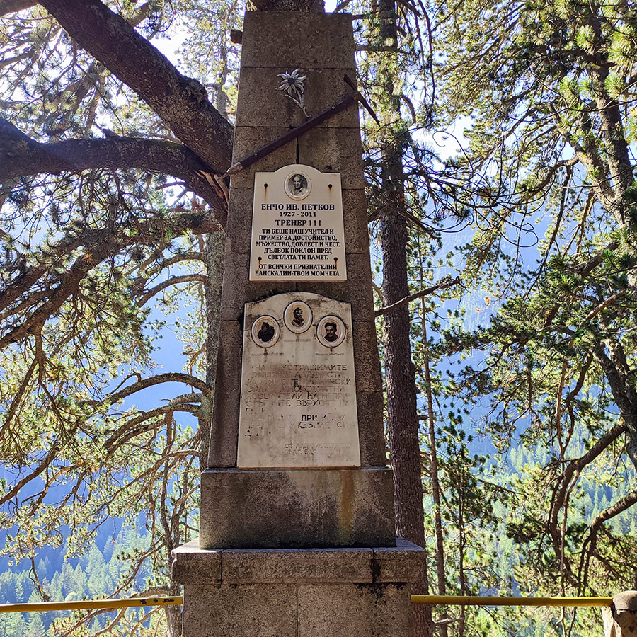 Memorial stone with inscriptions dedicated to mountaineers near Baykusheva Mura, Pirin.