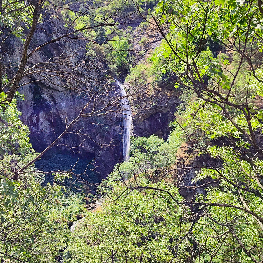 Scenic distant view of Goritsa Waterfall from the observation deck, Rila Mountain, Bulgaria.