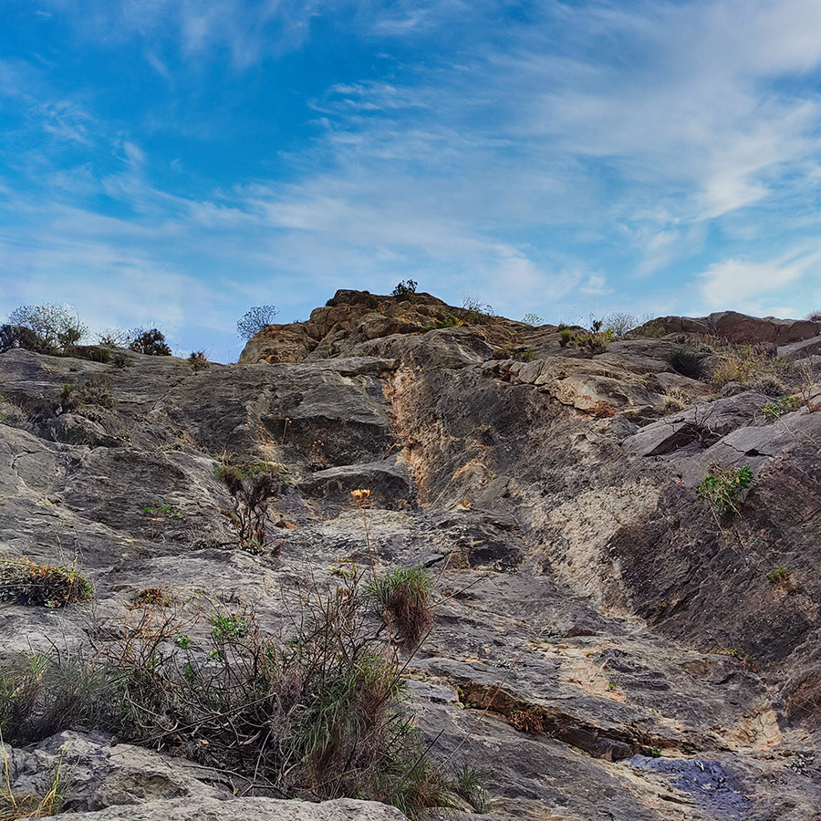 View upward along the limestone wall of Asterope route, Pleiades Crag.
