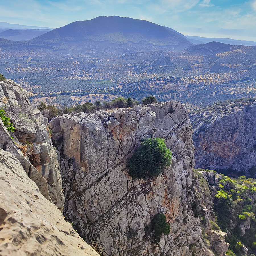 Panoramic view over Katafyki Gorge and Peloponnesian hills from Pleiades Crag.